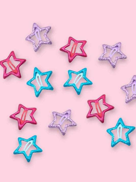 Glitter star shaped hair clips