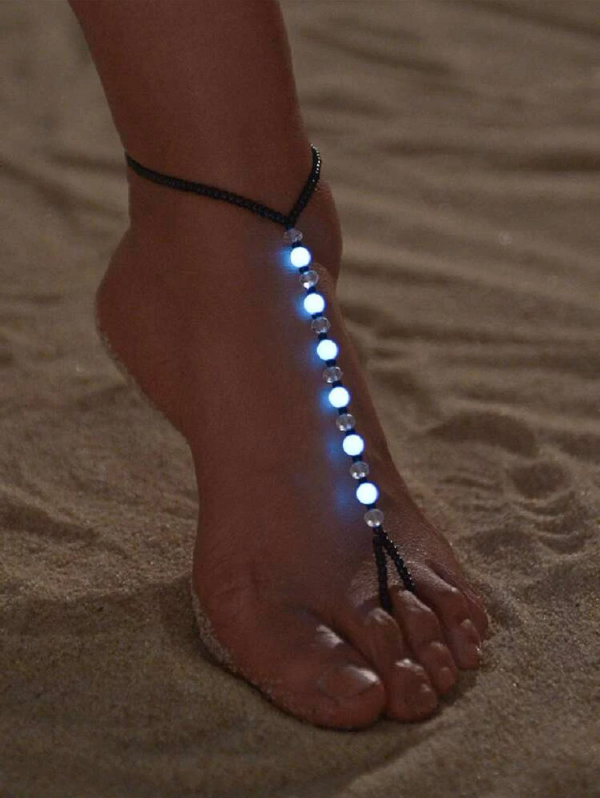 Black luminous beaded anklet.