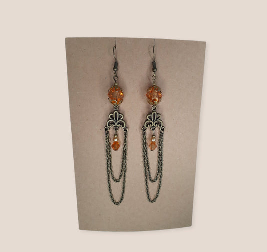 Vintage inspired amber detailed bronze chandelier earrings.