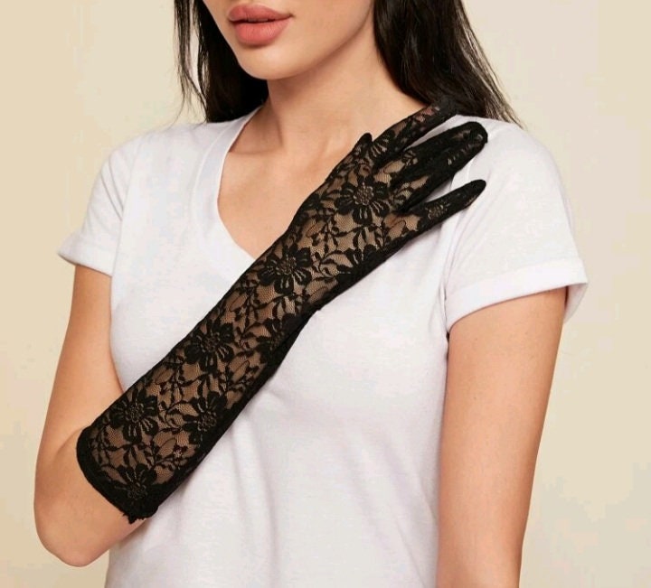 Below the elbow black lace gloves