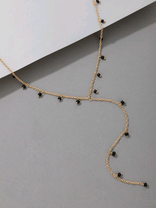 Minimalist beaded gold necklace