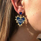 evil eye statement earrings on model