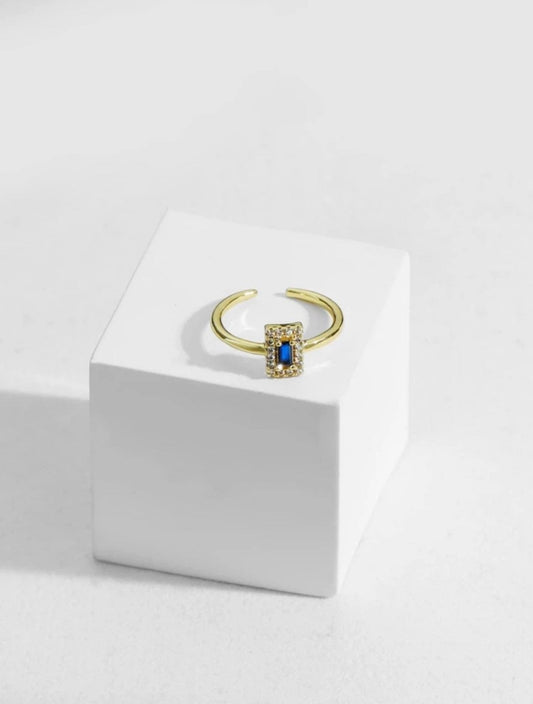 18k gold adjustable blue zircon ring.  High quality.