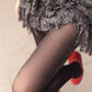 Sheer black pantyhose with glitter