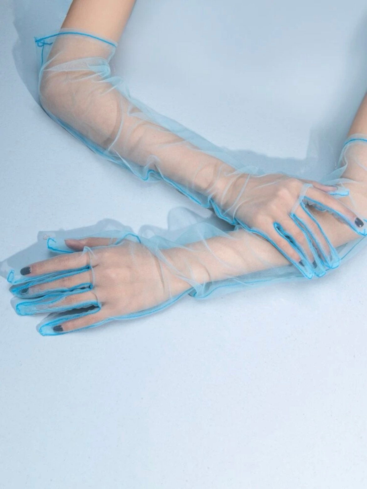Light blue transparent gloves